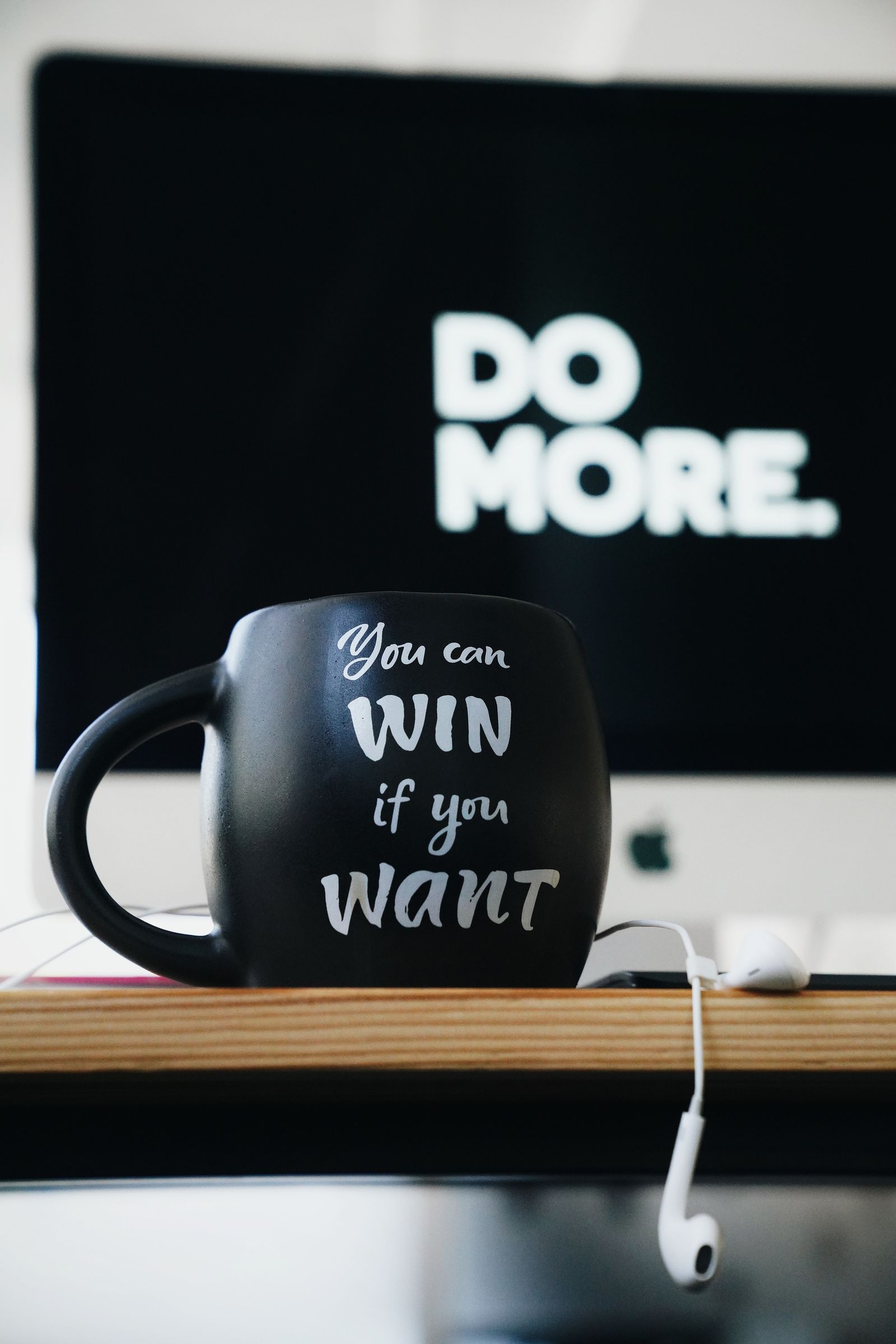 Mug with the text 'You can win if you want' (stock photo)