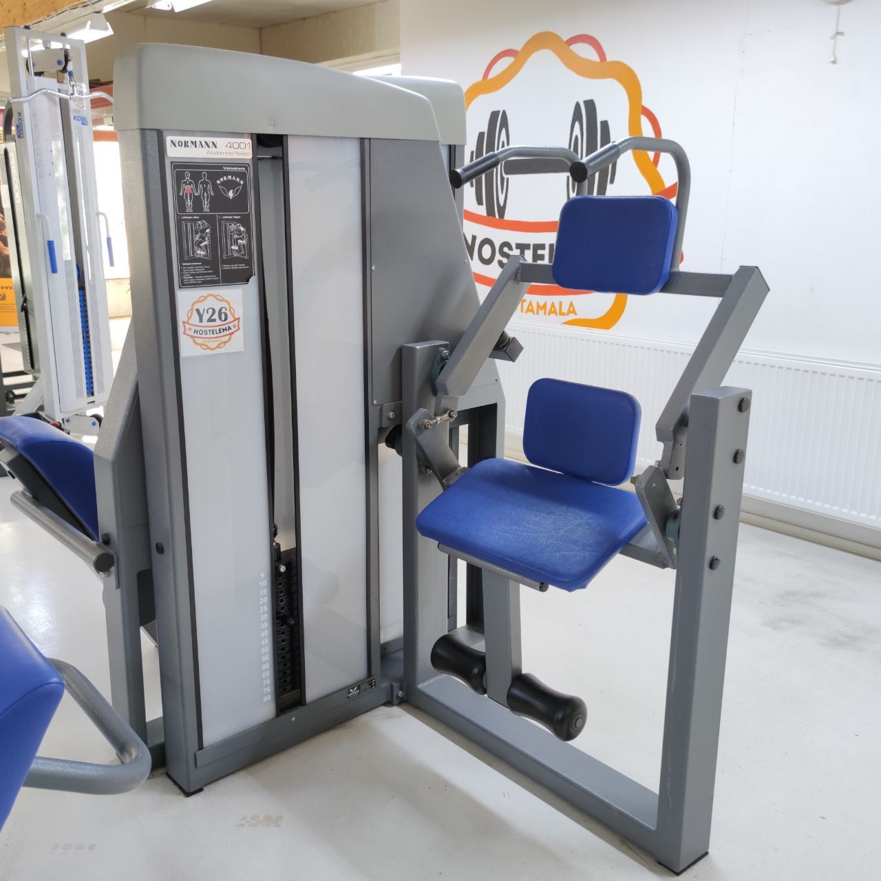 Normann ab crunch machine (4001): seat, shoulder pad with handles and ankle rollers
